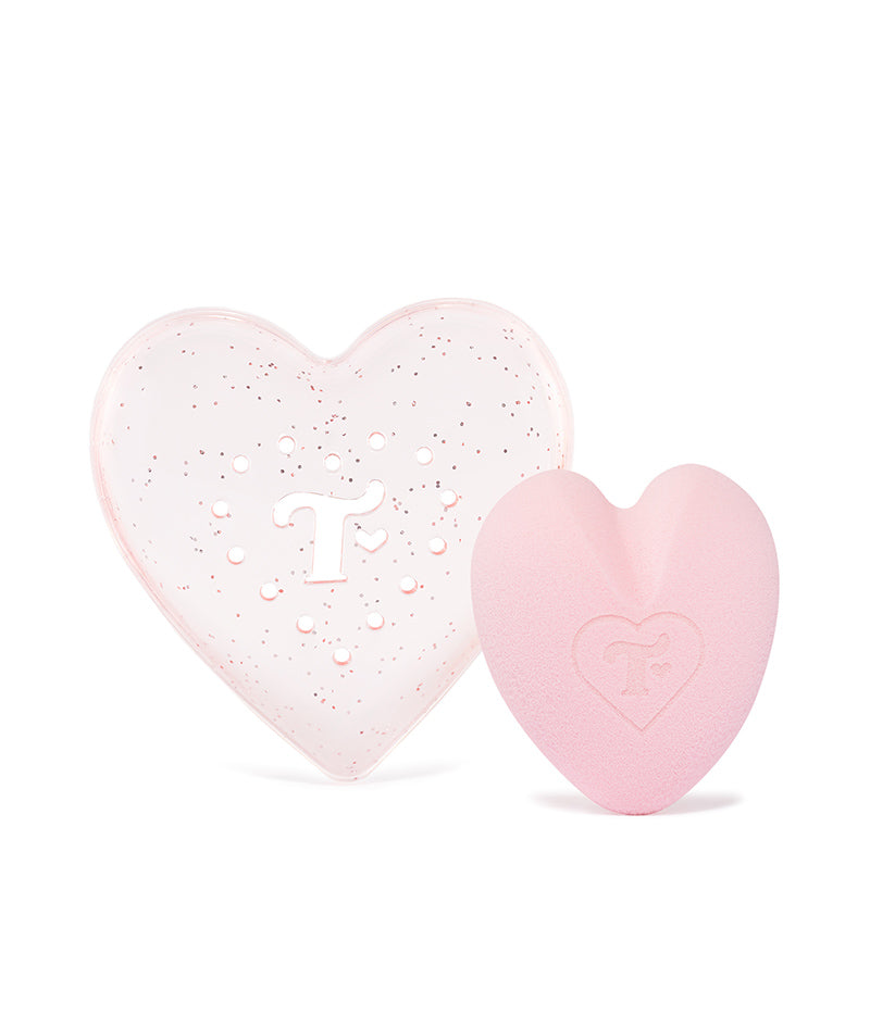 heart-shaped makeup sponge and pink glitter case